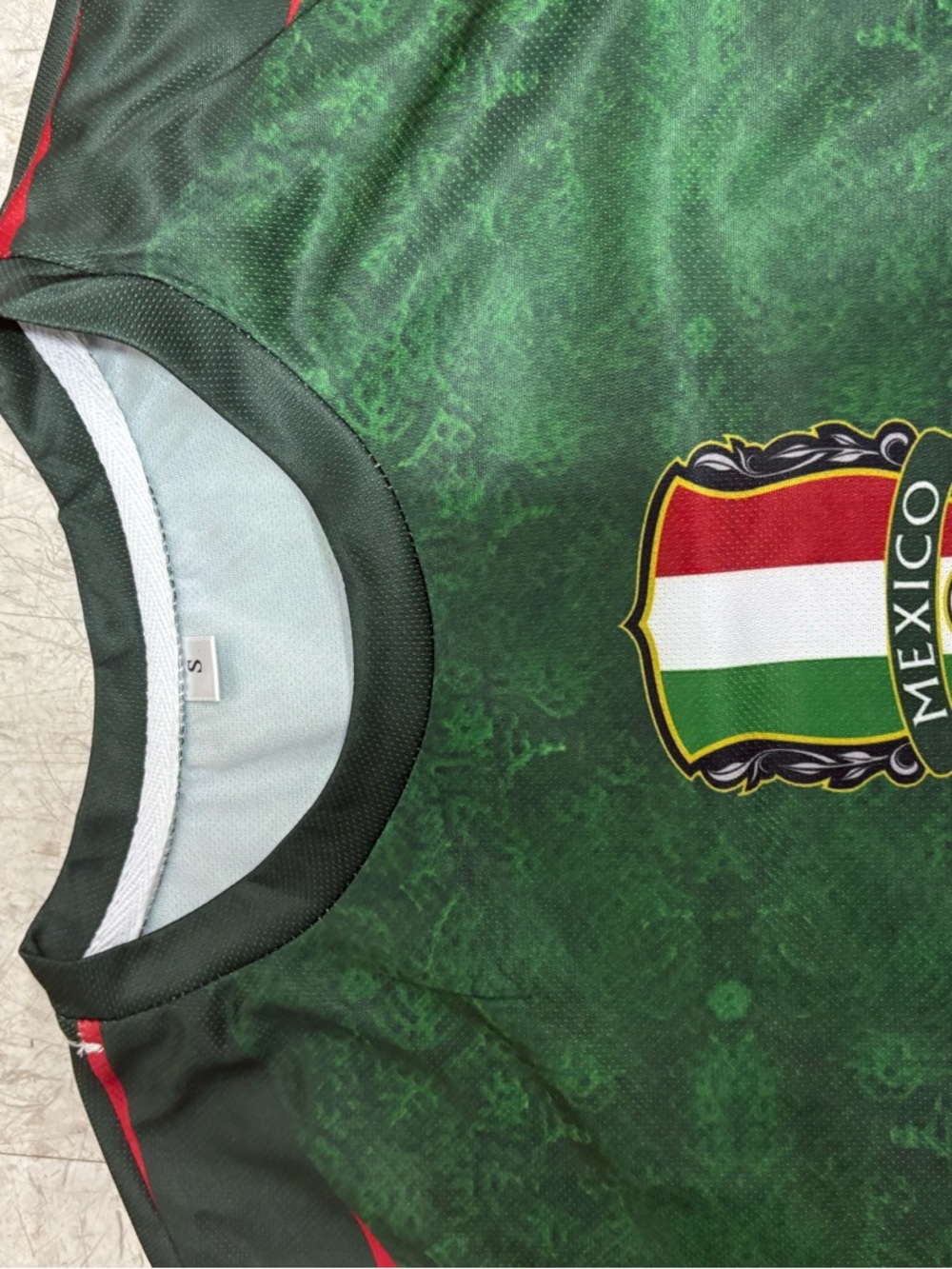 Team Apparel Green Mexico Crest Men's Jersey with Red and White Accents. Unisex